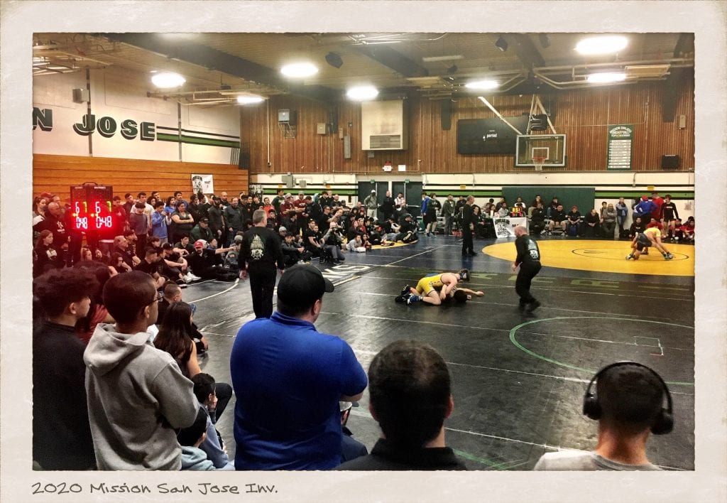 Long time tradition – Crowd surrounds the mats during the Mission San Jose Invitational Semi-Finals