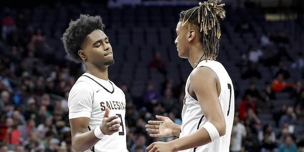 Salesian teammates Zion Yeargin and De'Undrae Peteete prepare to handshake during the CIF State Basketball Championship